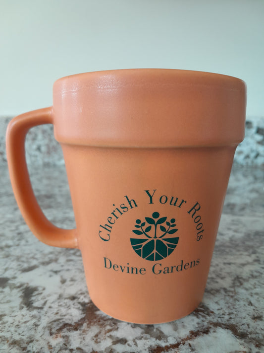 Front of Devine Gardens coffee cup