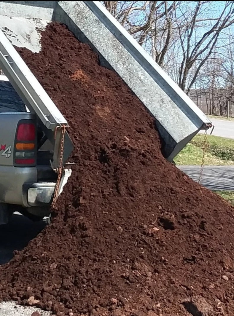 Devine Gardens compost dumping from truck